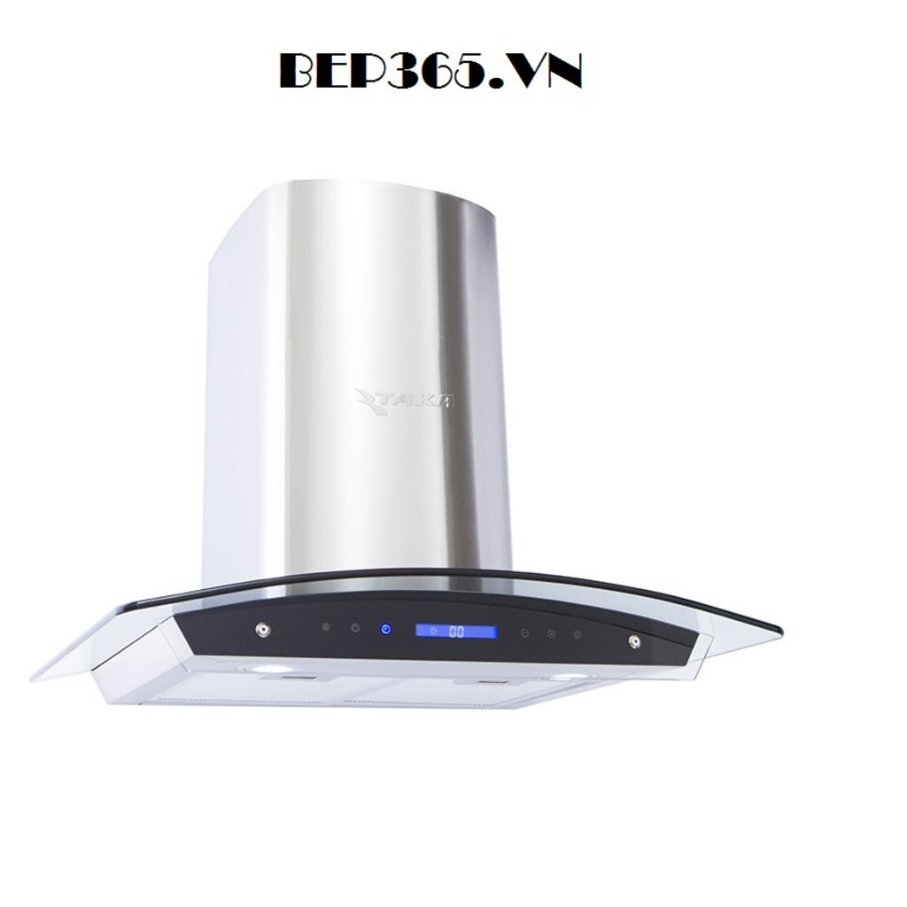 Máy hút mùi Taka TK-190I đặt trong bếp hiện đại chất liệu inox và kính chịu lực hiển thị bảng điều khiển cảm ứng sáng