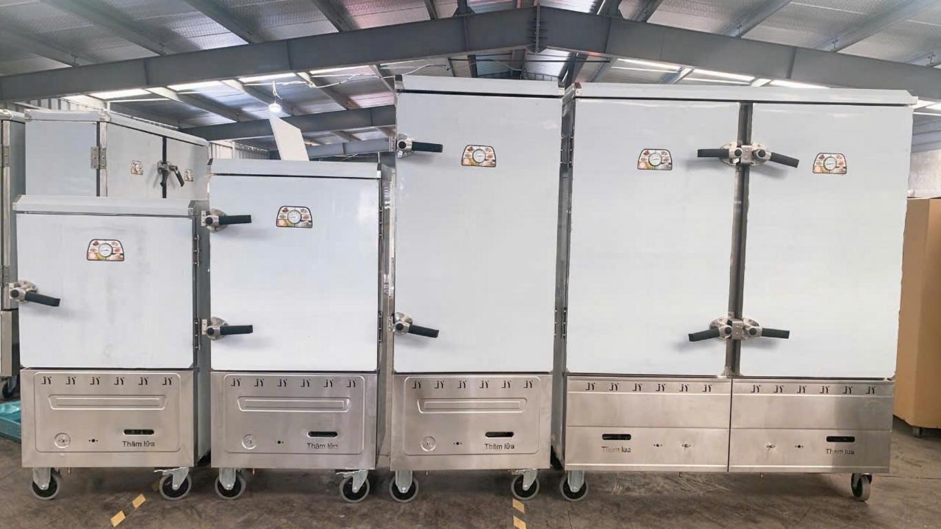 Sơ đồ cắt lớp một tủ hấp công nghiệp, chỉ rõ các bộ phận: vỏ inox 304, lớp cách nhiệt, thanh nhiệt, phao cấp nước, van xả áp.